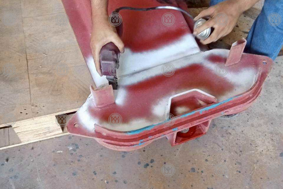 Contrast paint applied to a repaired bolster before testing